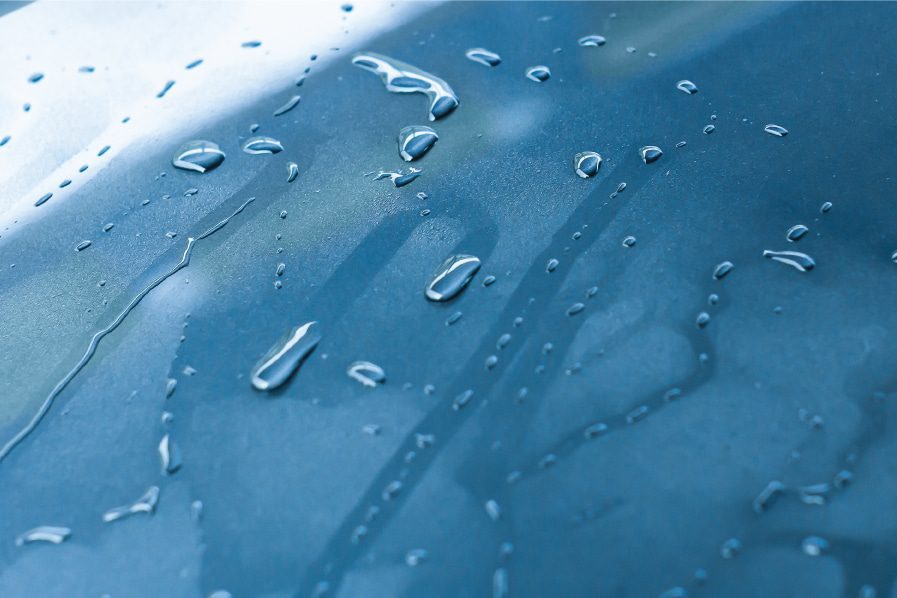 Water running of a windshield in USA rainy weather which allows for safer driving